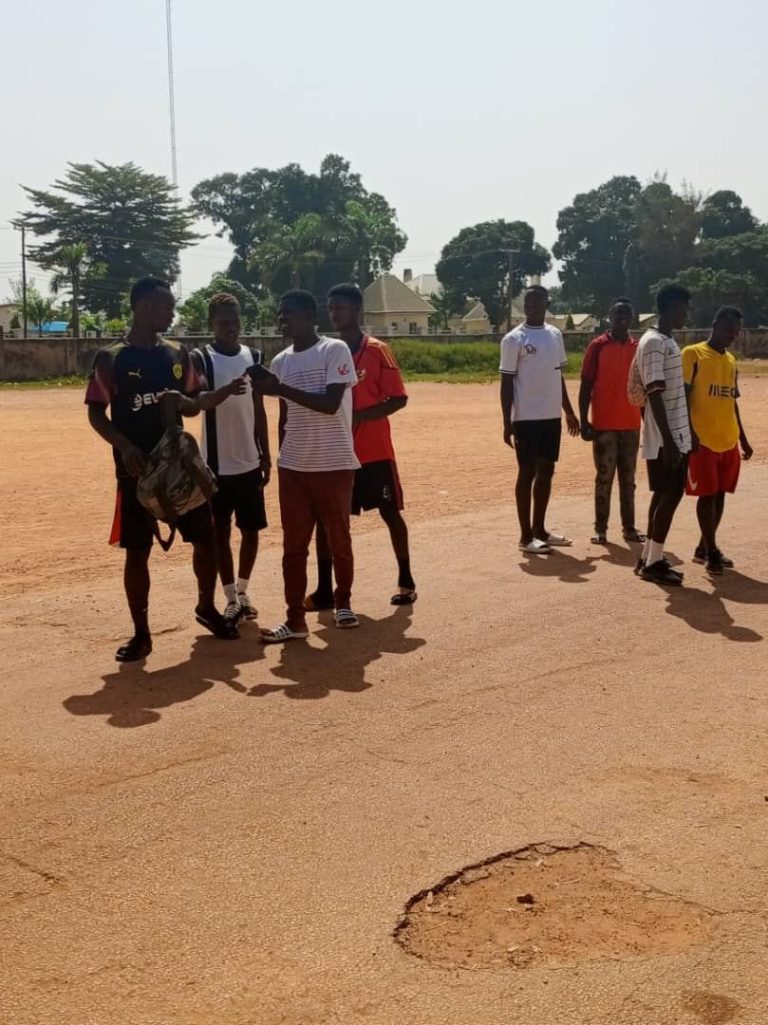 Coaches’ Feedback Style Decides Whether Teenagers Stay in Sport young footballers training on a field
